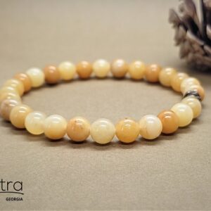 6 მმ. ოქროსფერი ჟადეიტის სამაჯური კაუჩუკზე